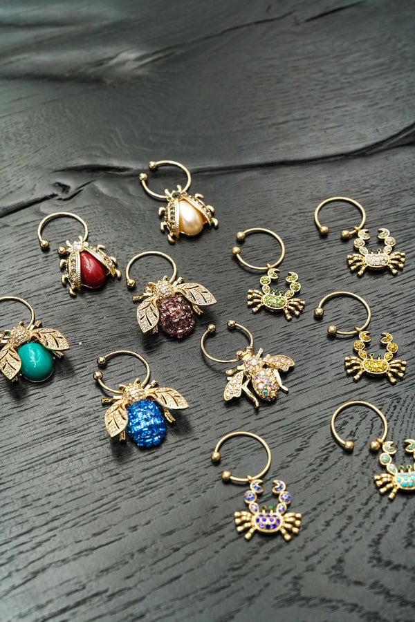 Bedazzled bee wine charms, dark jewel tones